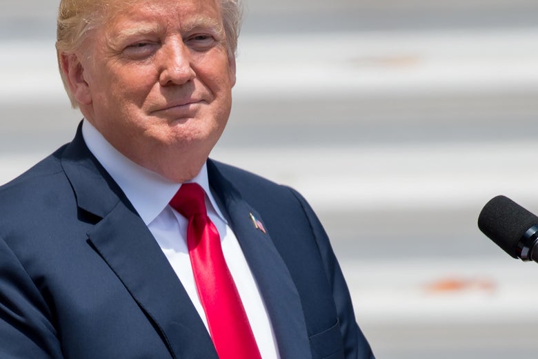 US President Donald Trump speaks as he honors NASCAR Cup Series champion Martin Truex Jr. and his team, during a ceremony on the South Lawn of the White House in Washington, DC, May 21, 2018.